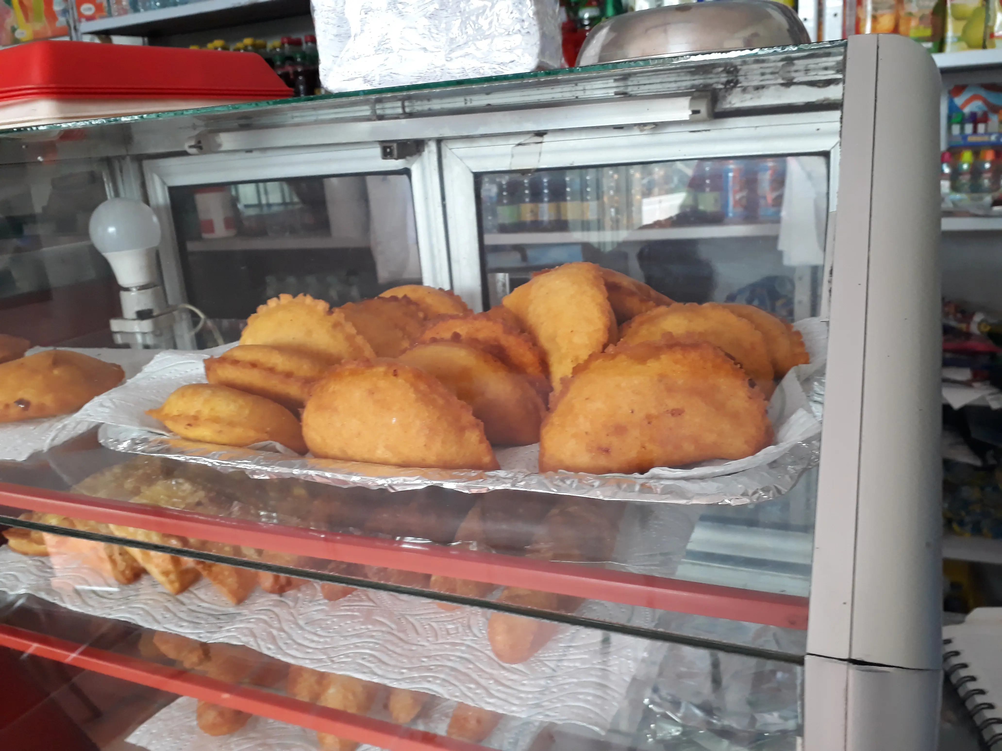 Preparación tradicional de empanadas de verde